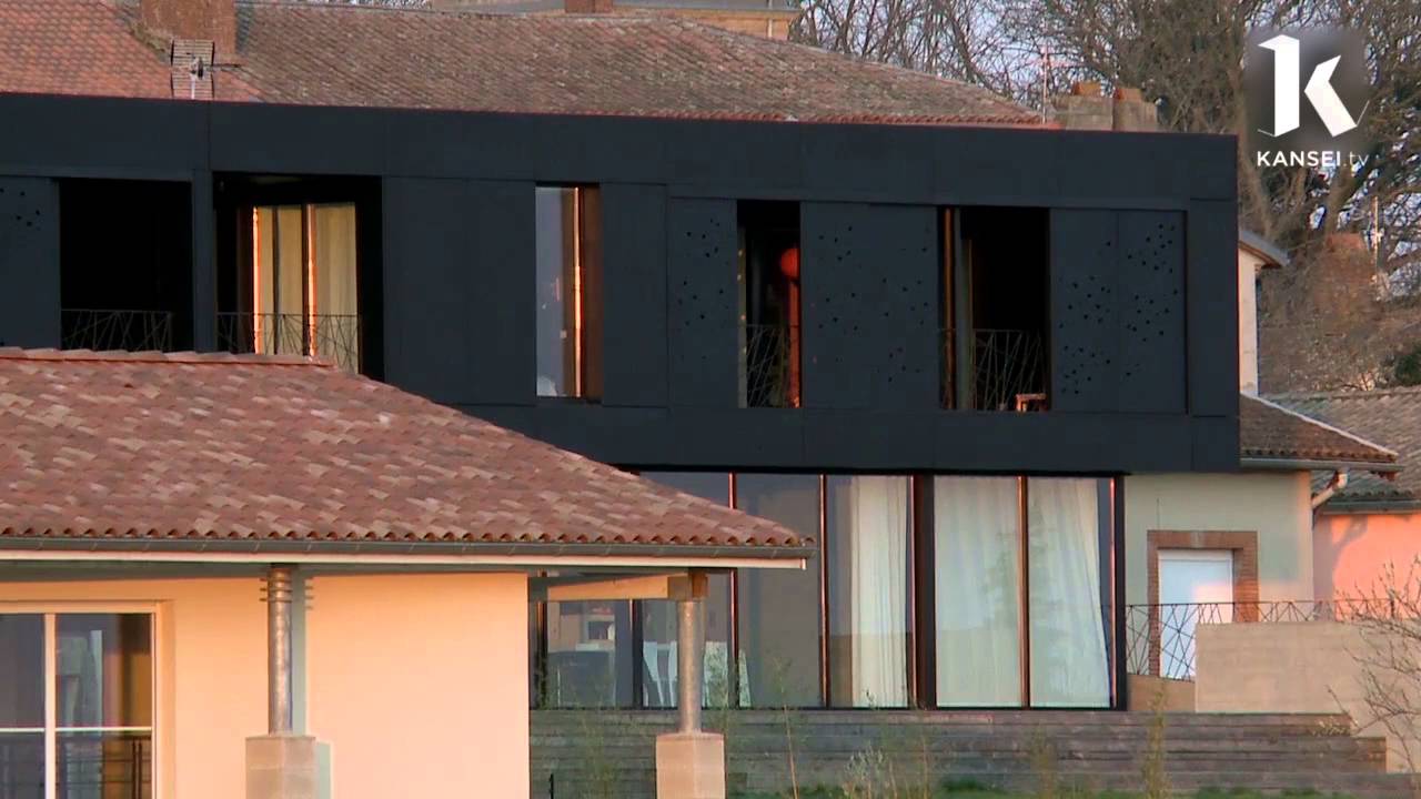 Maison en Beton Brut et Acier Noir