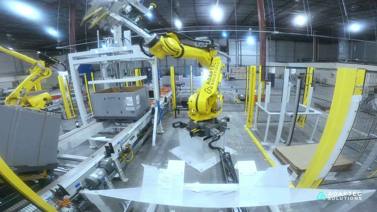 Consumer Packaging Leader Increases Process Ergonomics with Dual FANUC Robotic Assembly System