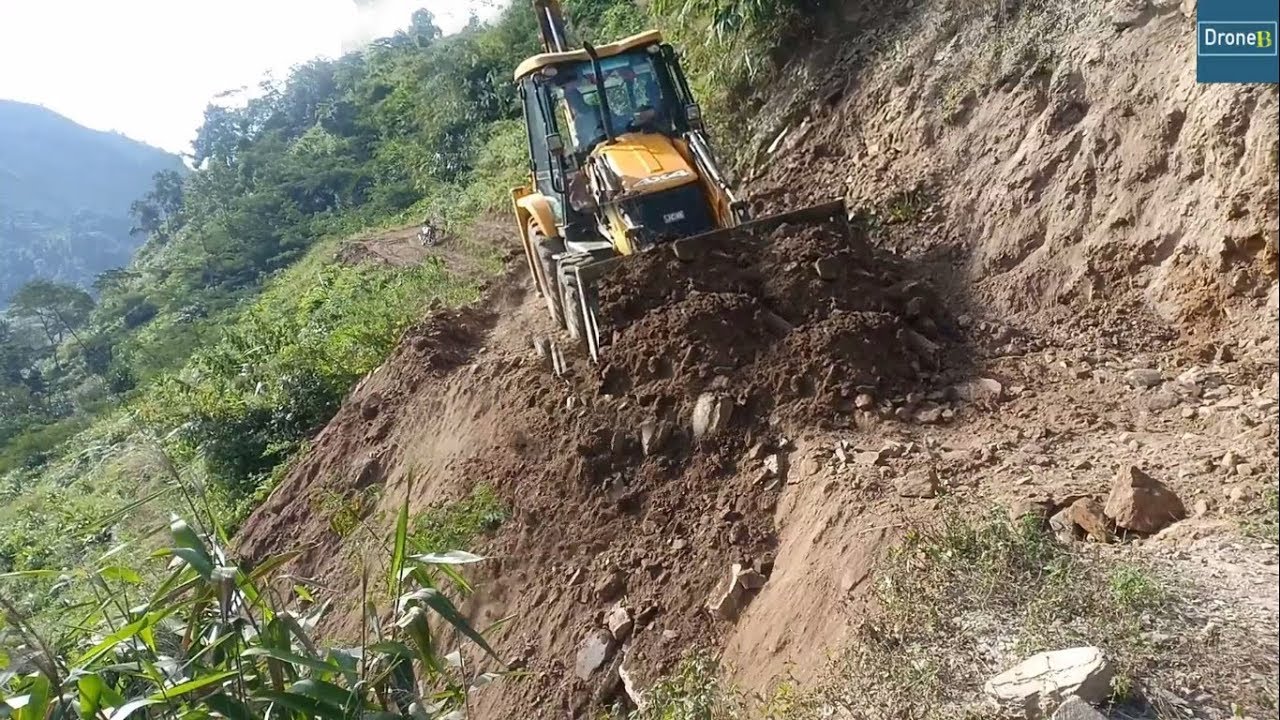 JCB Backhoe Loader Real-Clearing Land Slide in Hilly Region