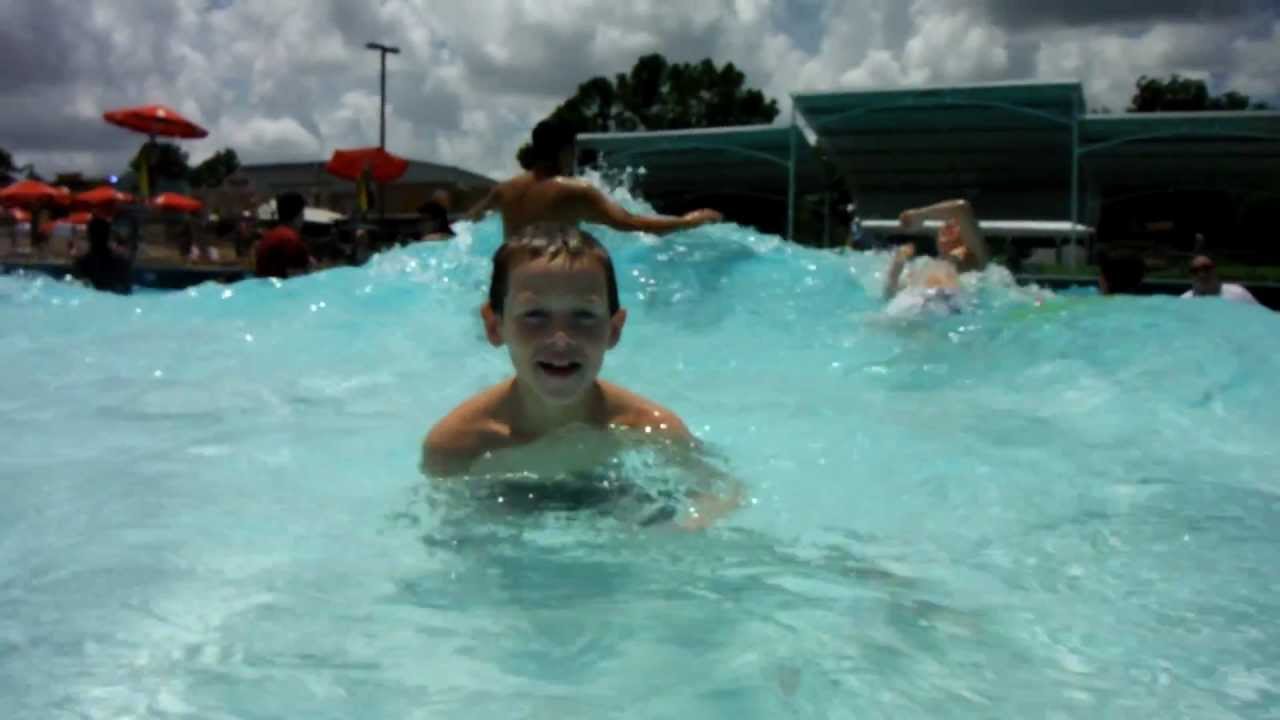 Taylor and CP Kubosh underwater wave pool at Splashtown
