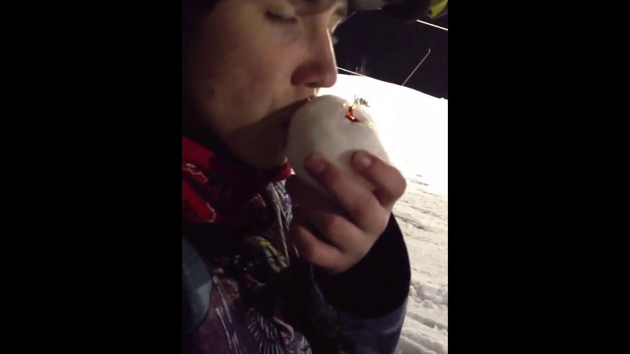 Smoking weed out of a snowball