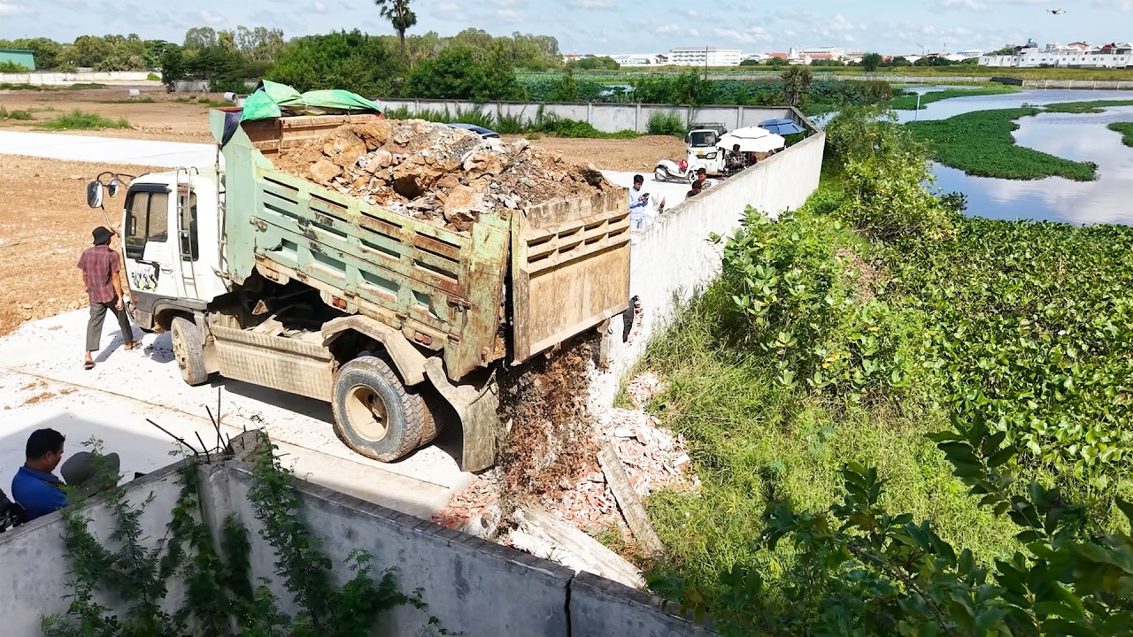 New Start Landfill Project! Skill Bulldozer Push Stone Mix Soil Into Large Flood Land With Trucks