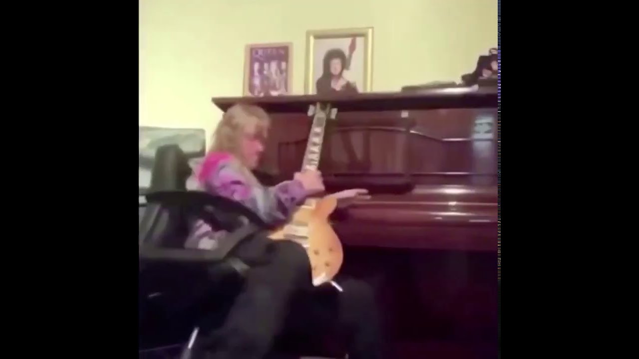 Guitar Man falls off chair