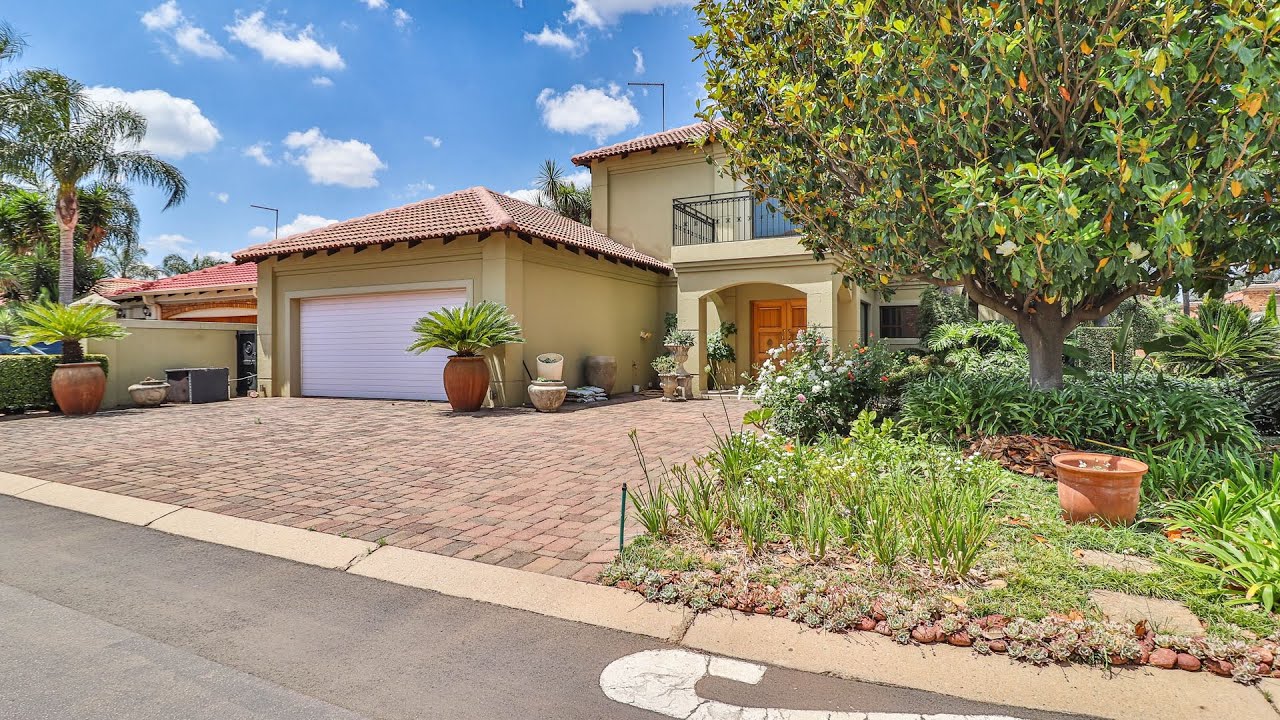 ELEGANT DOUBLE-STOREY FAMILY HOME IN A SECURE ESTATE WITHIN A BOOMED NEIGHBOURHOOD