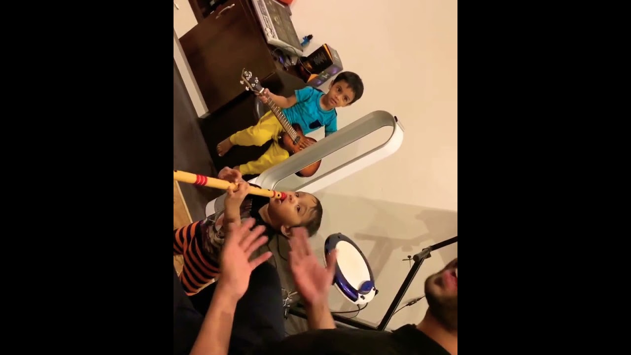 Dr Raj Prakash Paul worship with little ones 