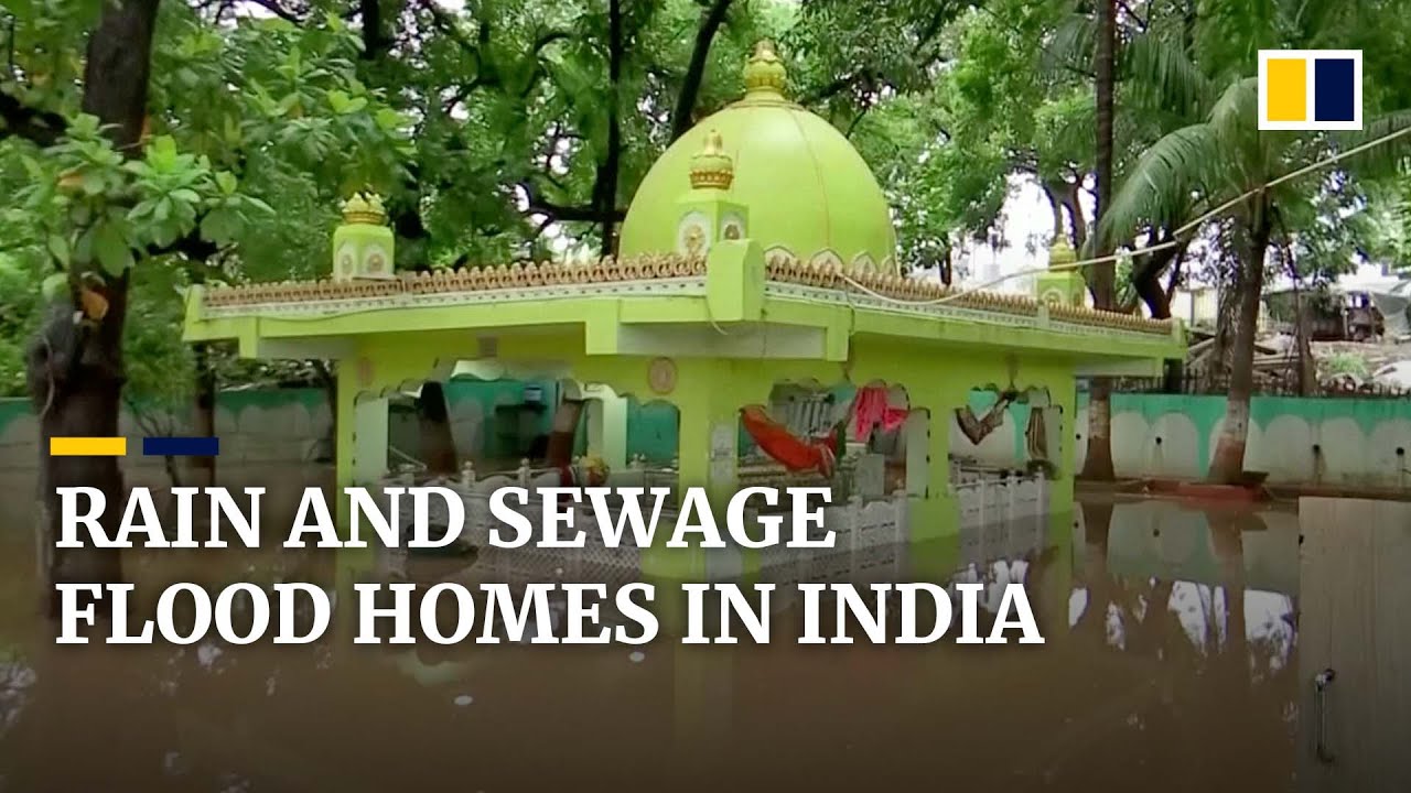 Flooding wreaks havoc in western India, bursting riverbanks and submerging homes