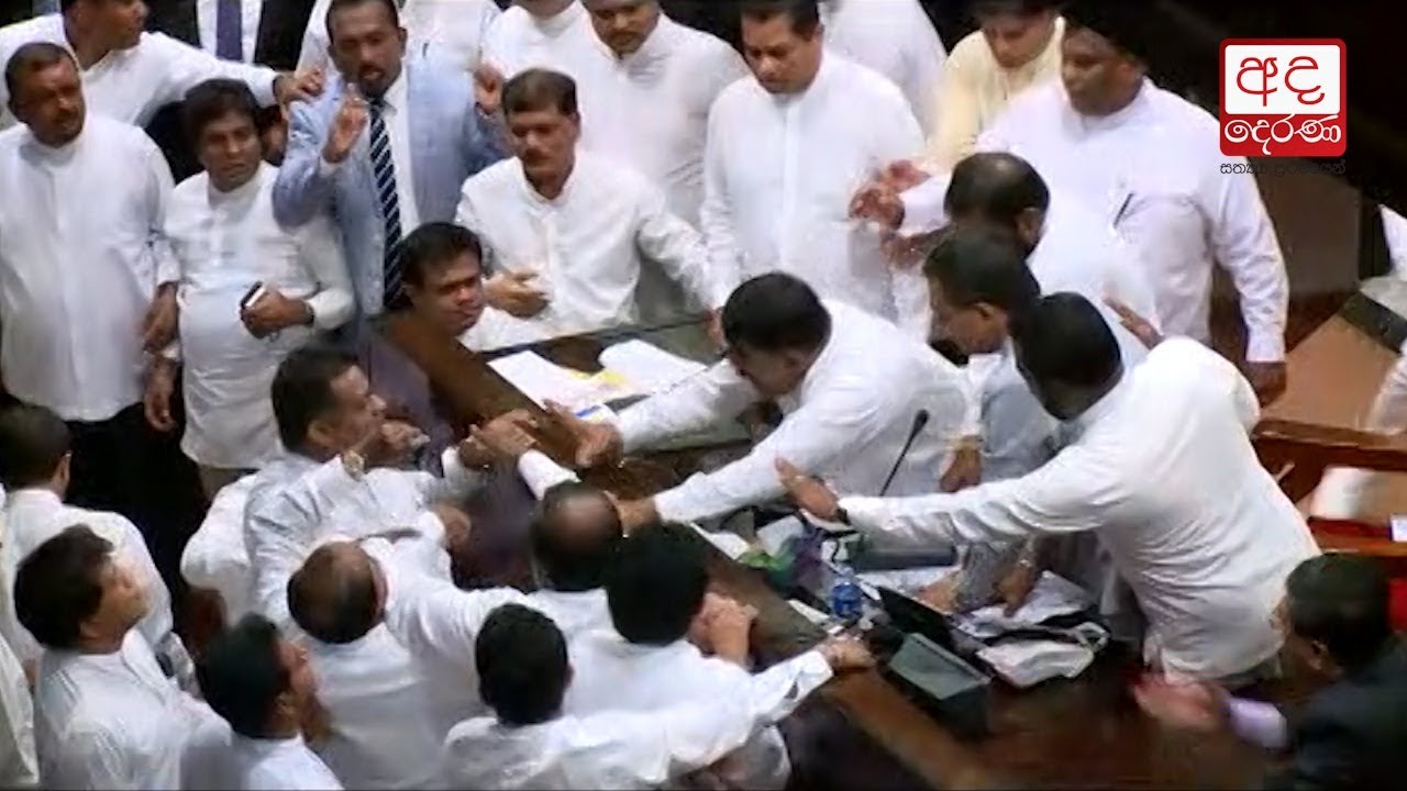 Govt and opposition MPs clash during Parliament session