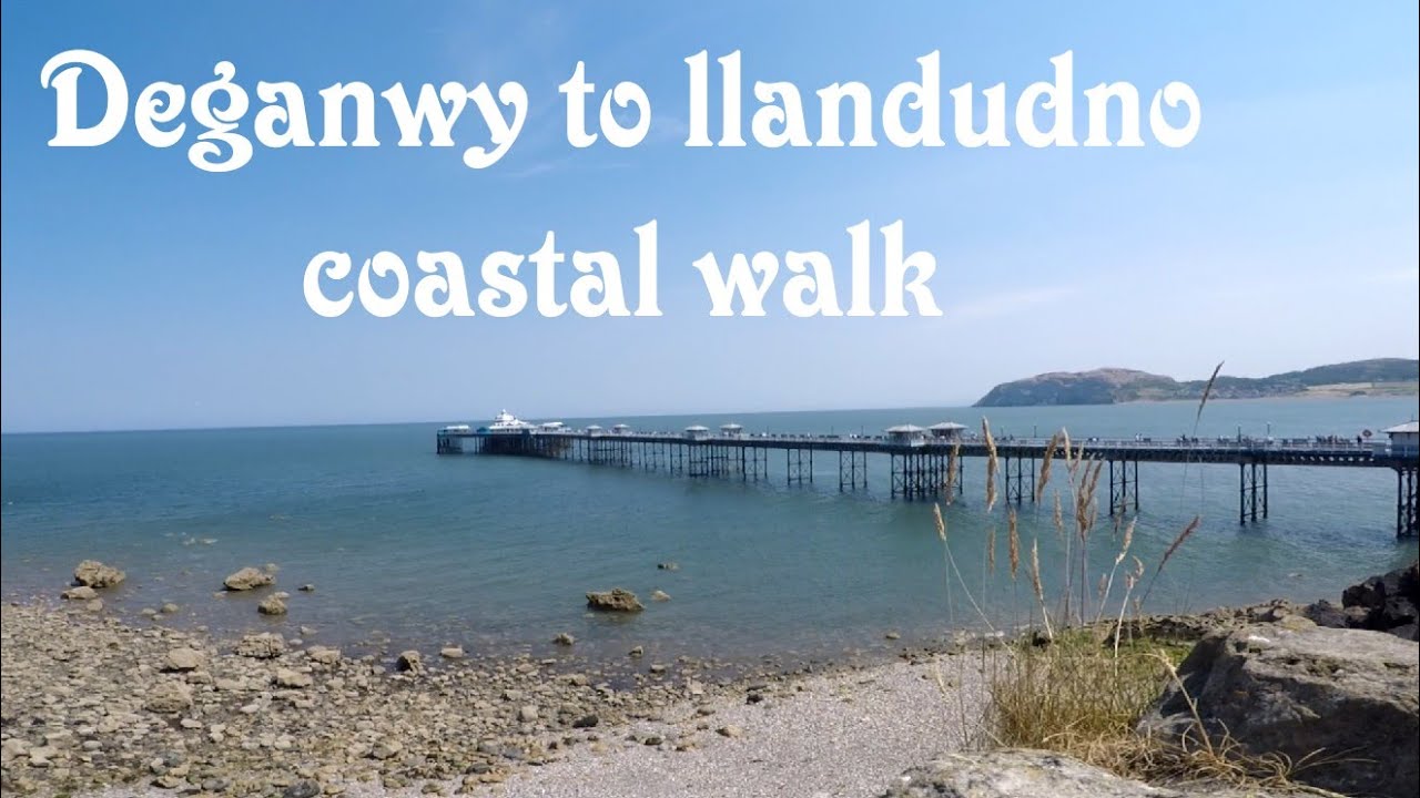 Coastal beach walk from Deganwy to llandudno pier and the great orme, Wales UK