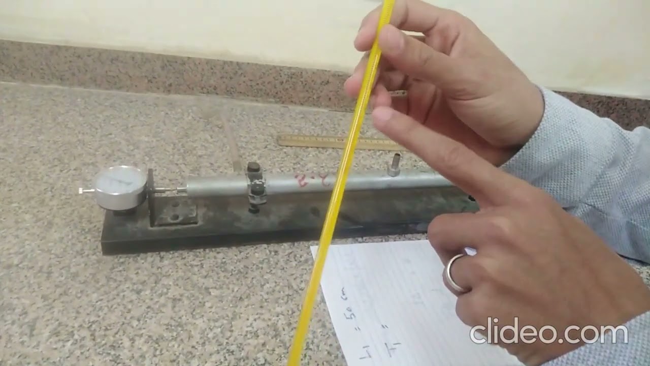 تعيين معامل التمدد الحرارى الطولى