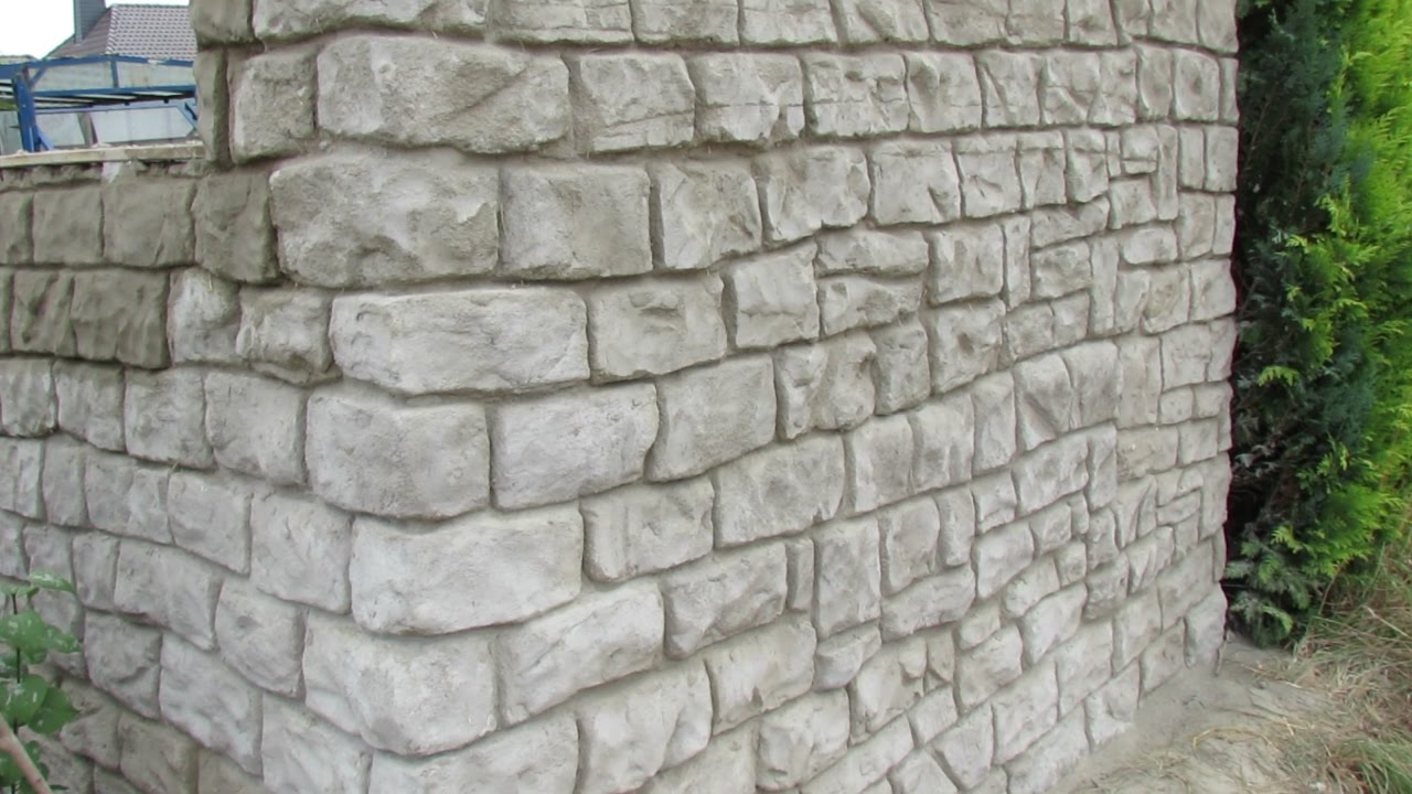 Mauer aus Beton in Steinoptik selber verkleiden .