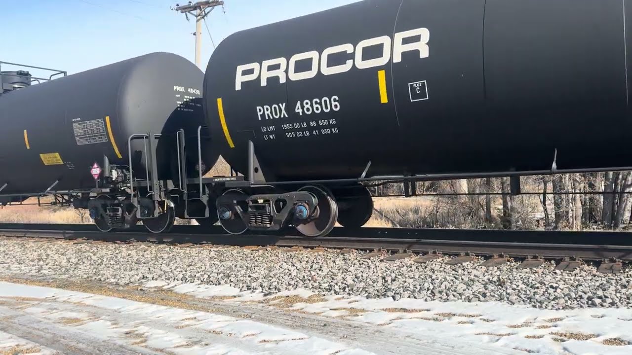 CP #8894 Lead’s The EB Manifest Freight Train Through Minneapolis, MN With Mid DP Unit 2/27/2026.