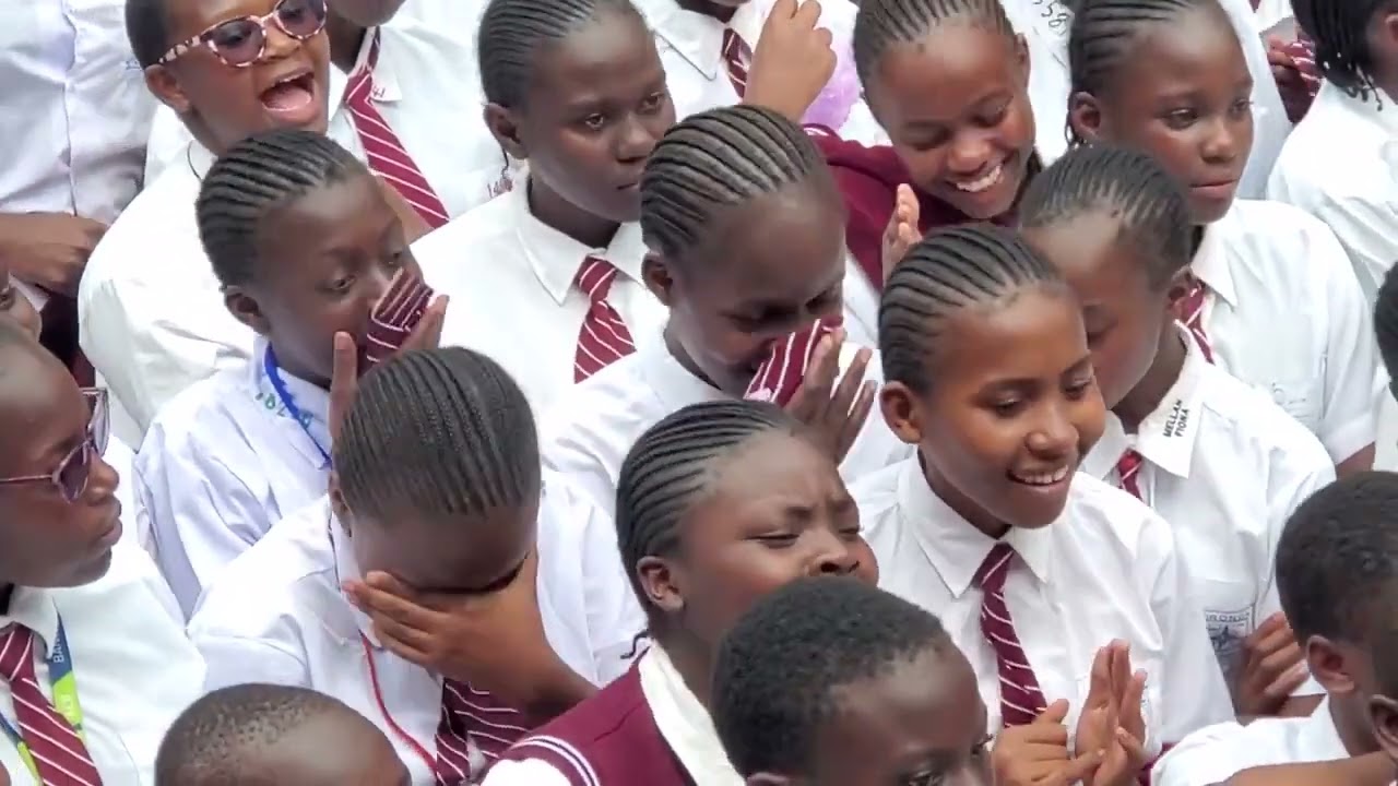 Emotional Sironga Girls bid farewell to their Principal Eva Odhiambo as tears freely roll down.