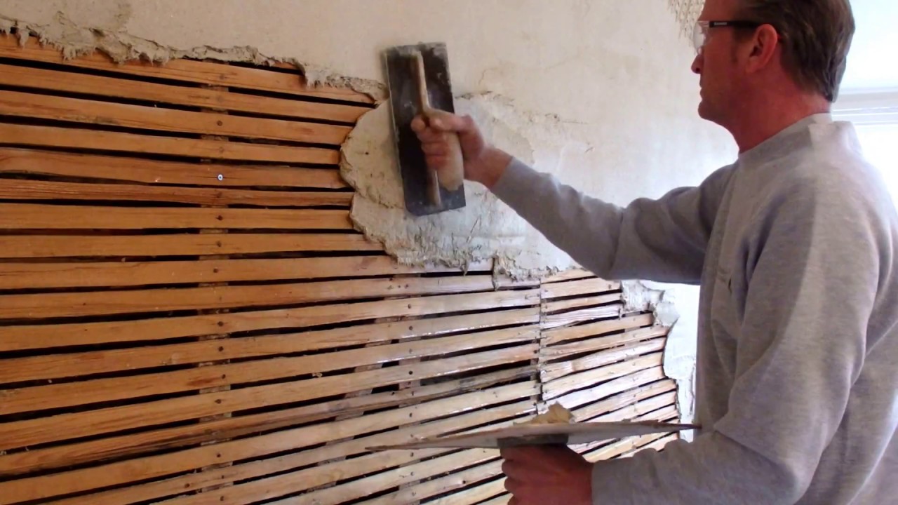 Traditional Lime plaster on laths, first coat of lime plaster onto a lathed wall in Kent - 2018