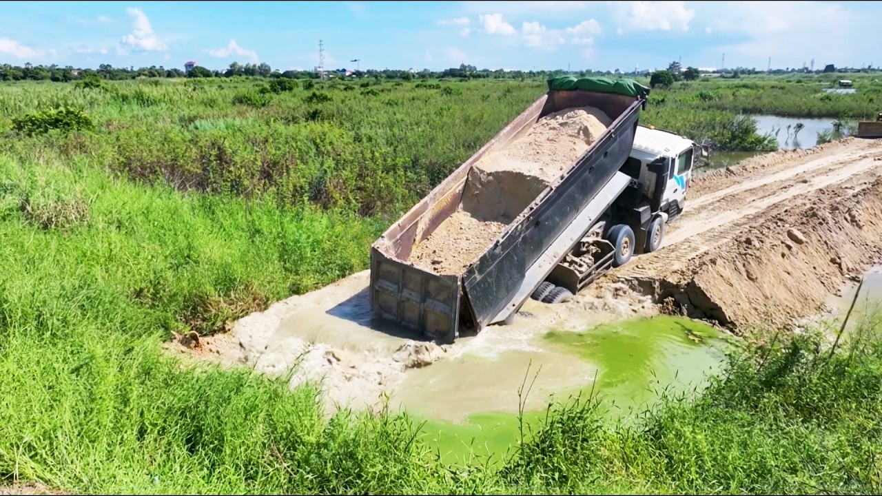 WOW!! Extreme!! 😱 Dump Truck Unloading Dirt Near Water Goes Wrong &ndash; Ground Collapse Disaster!