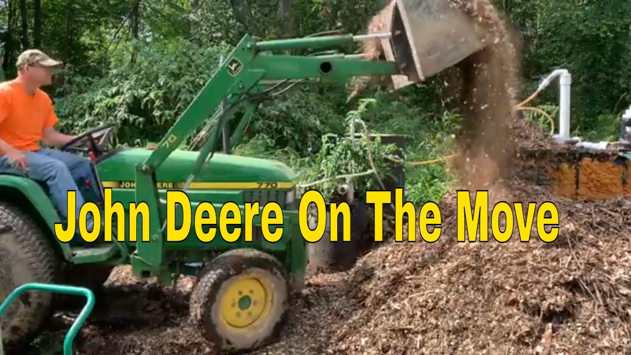 John Deere 770 Moving Mulch