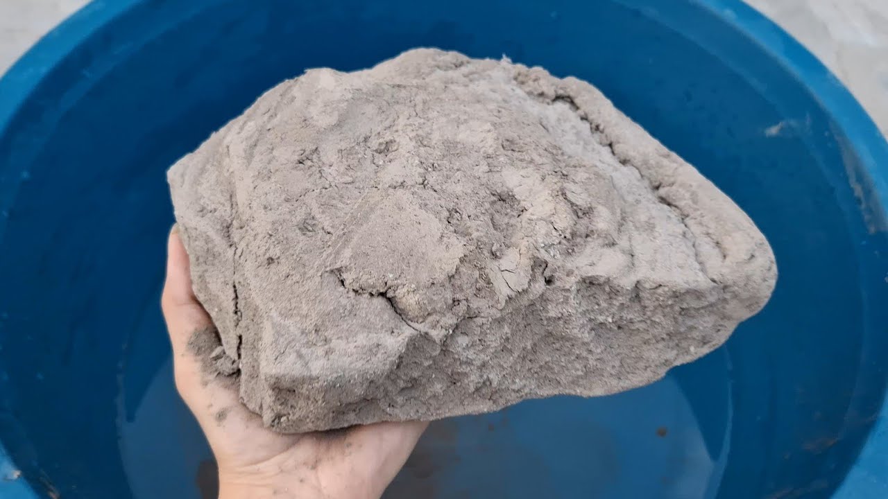 New video Black dirt water crumbling 