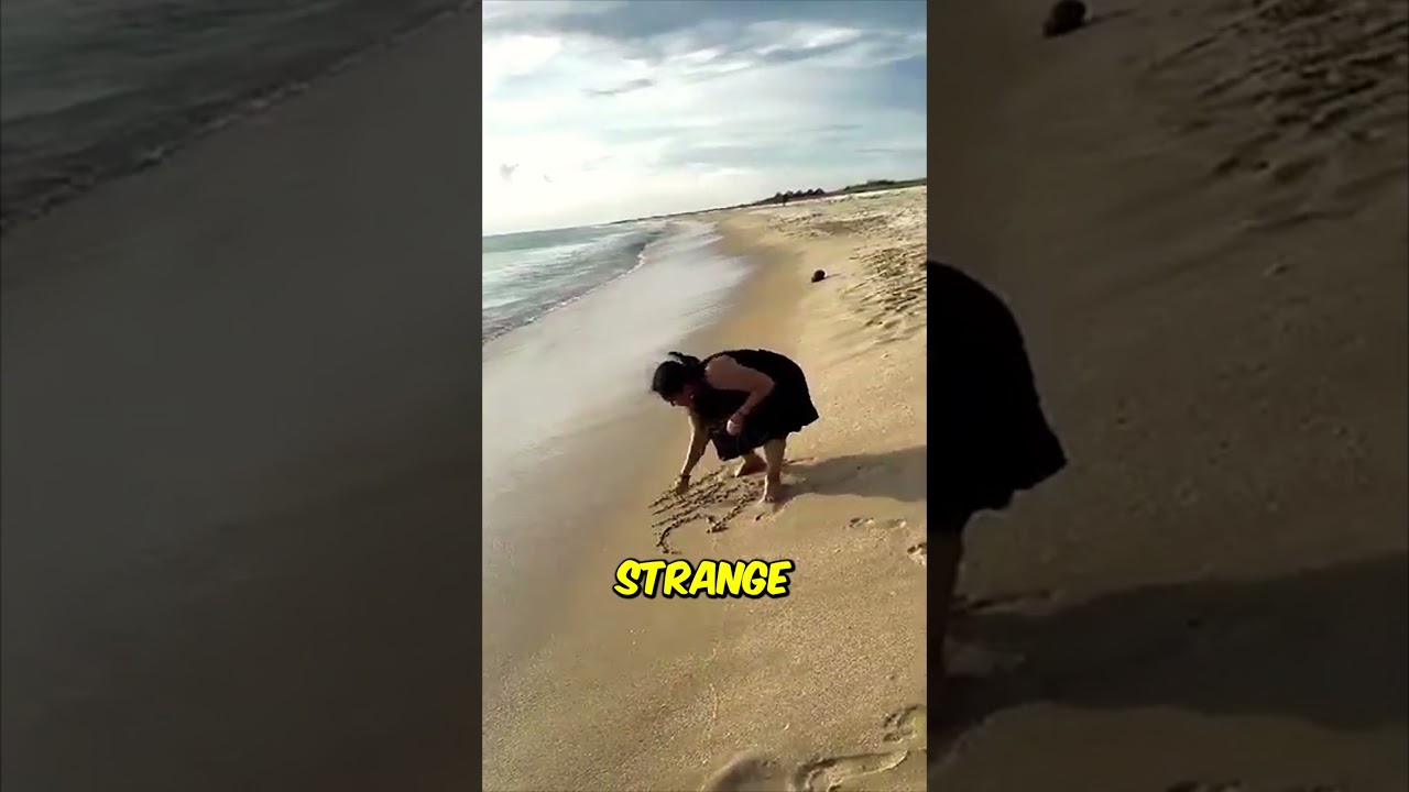 Она написала &laquo;БОГ&raquo; на песке&hellip; 😱🌊 #шорты