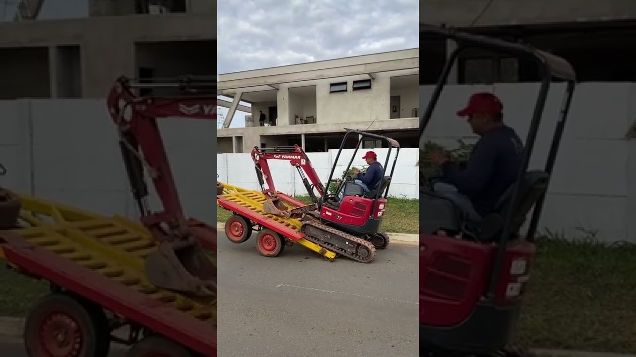 Mini escavadeira Yanmar vio 17 descendo da carretinha sem rampa