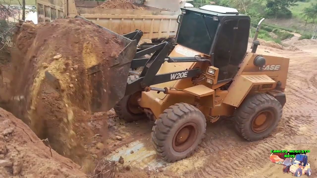 pa carregadeira w20 carregando caçamba truck