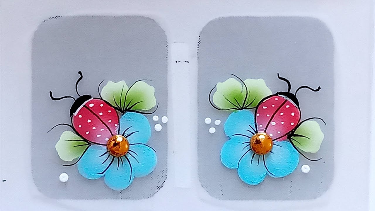 Adesivo de Unha - FLOR AZUL COM JOANINHA