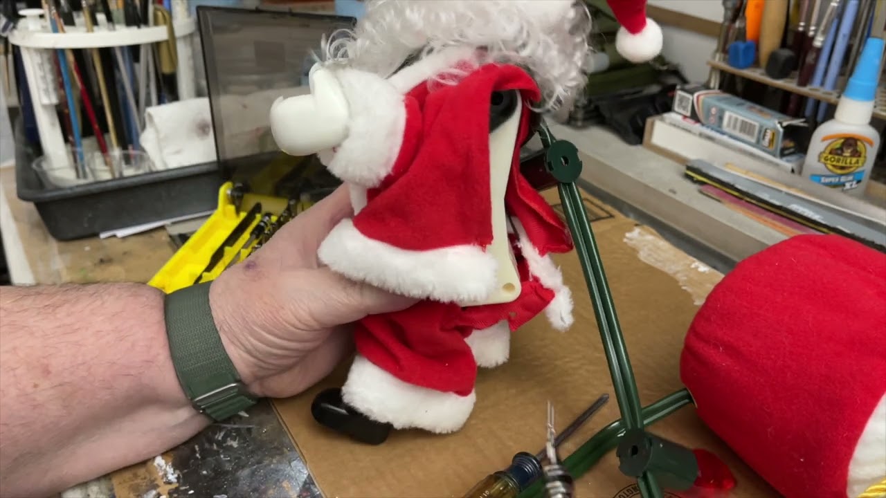 Inside a Mr christmas climbing  Santa