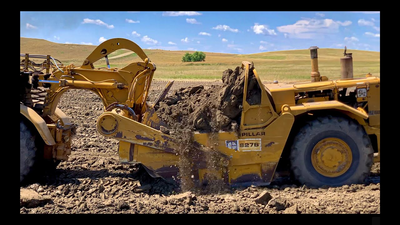 Getting Heaped Loads with a 627B Scraper (Boiling Over)