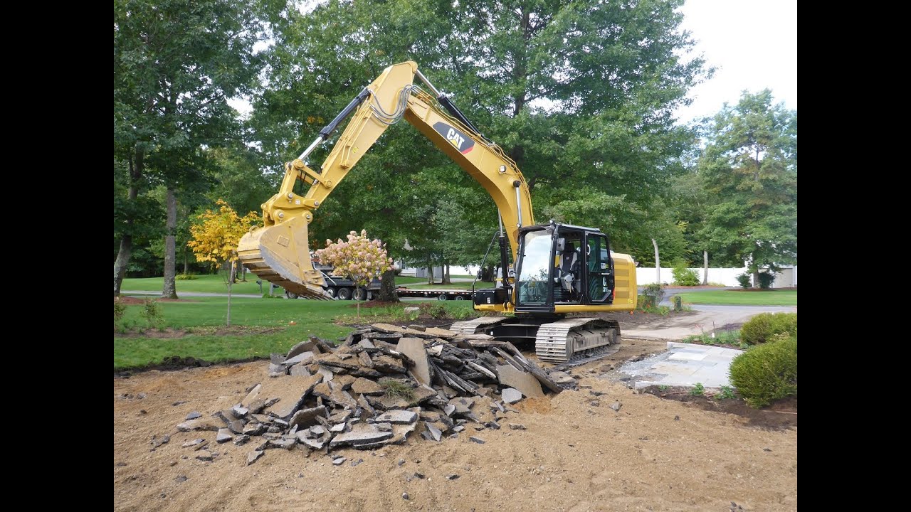 Cat 316E Digging Up and Loading Out Asphalt