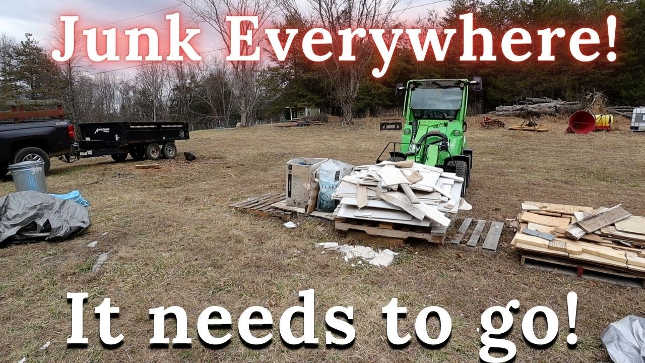 Cleaning up junk piles with the Avant 755i Tractor to prepare for our upcoming food forest.