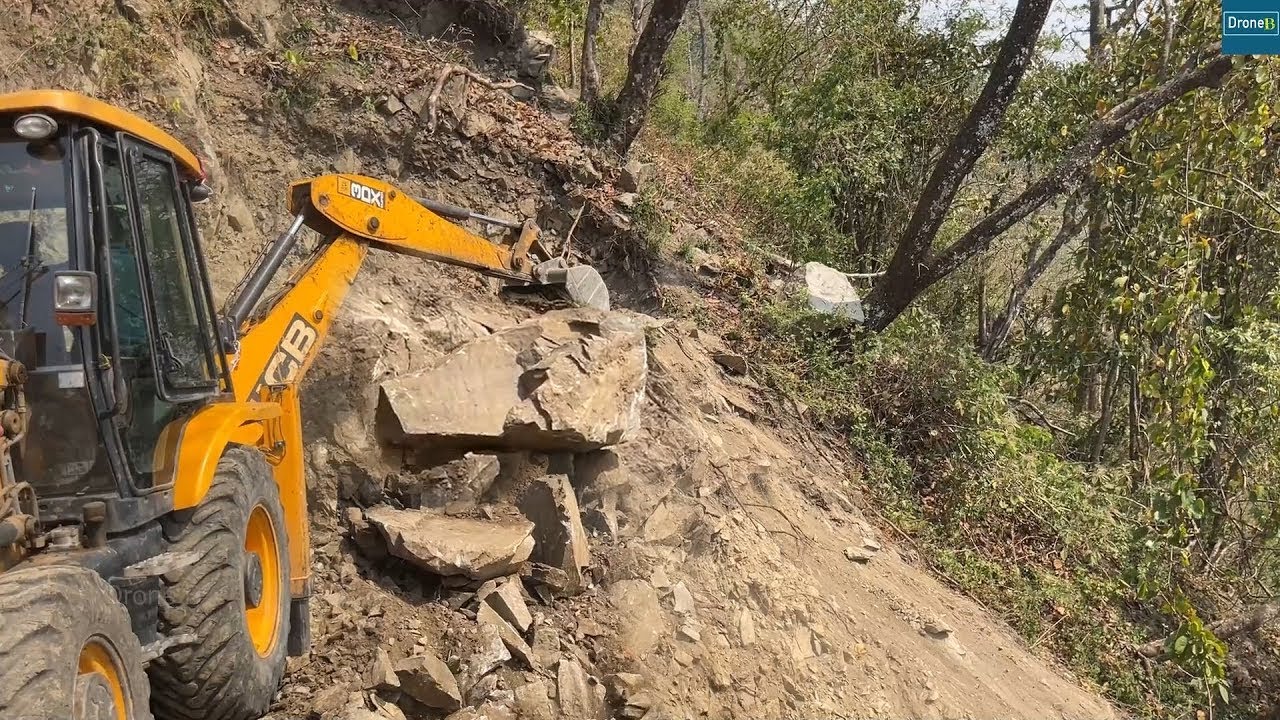 Bucket Tooth Broke Down Breaking this Rocky Mountain on a Super Windy Day-JCB Backhoe Struggle