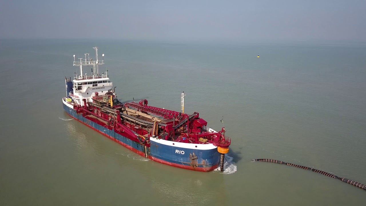 Strandwerk de Haan met TSHD 