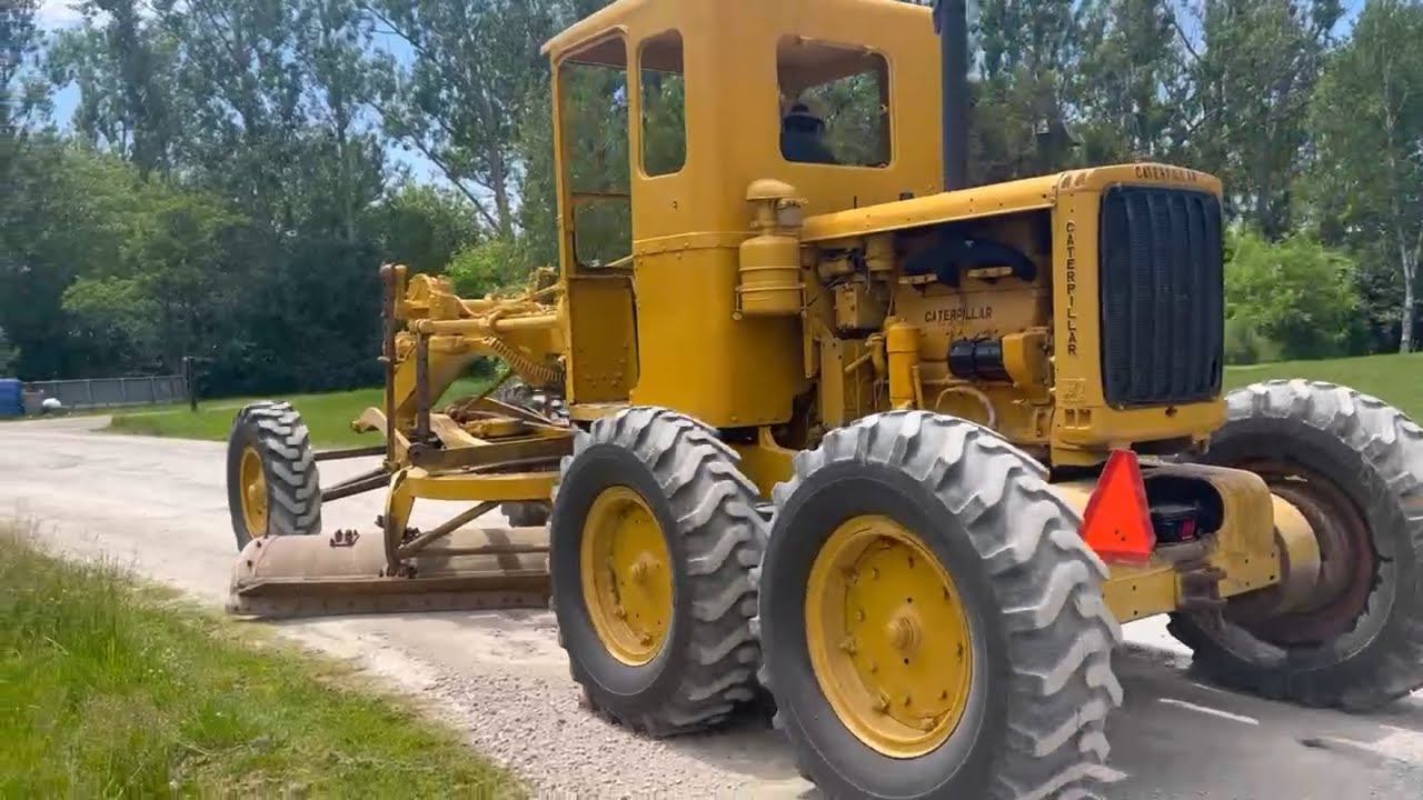 Putting the Caterpillar 112 Motor Grader to work.