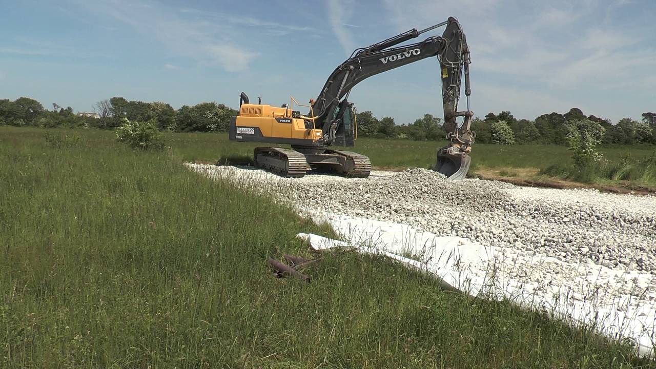 Excavators and trucks at a road construction site outside Visby June 2016
