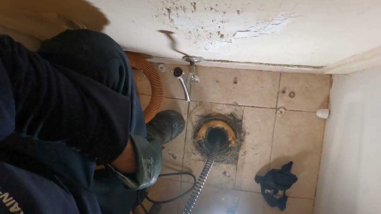 TUB AND TOILET BACKING UP 1