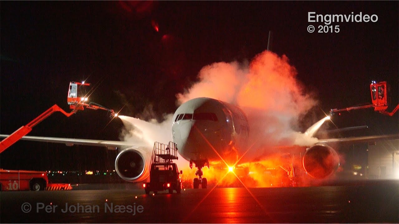 De-ice operations at night Oslo Airport Norway