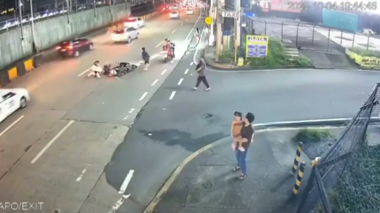 Skateboard accident causes motorcycle crash in Manila, Philippines