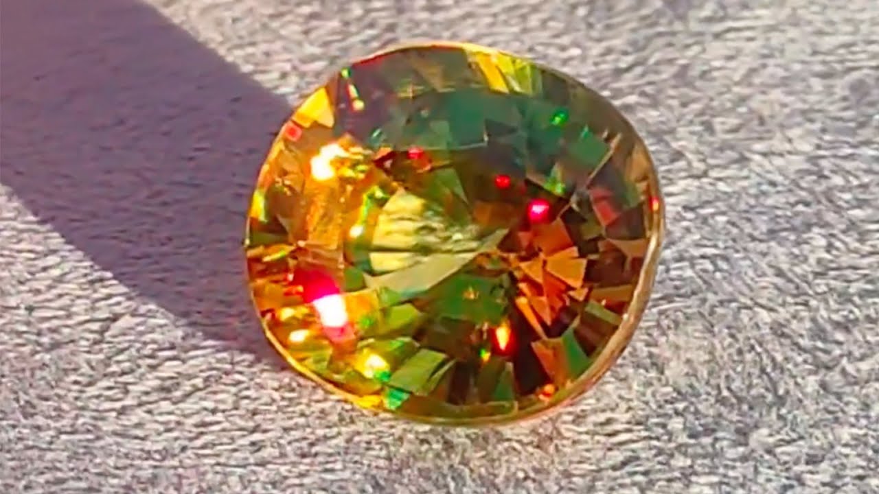Сфен 8,04 ct из Мадагаскара. Гем. исследование и оценка по Golden Parity