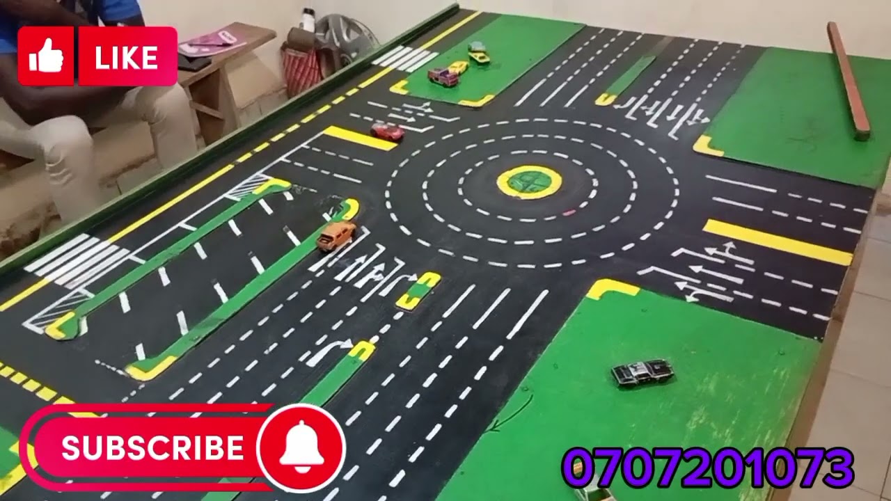 MAJOR & MINOR ROAD OPTIONS DEMONSTRATE ON MODEL TOWN BOARD. BEST INSTRUCTOR DRIVING SCHOOL PASS EXAM