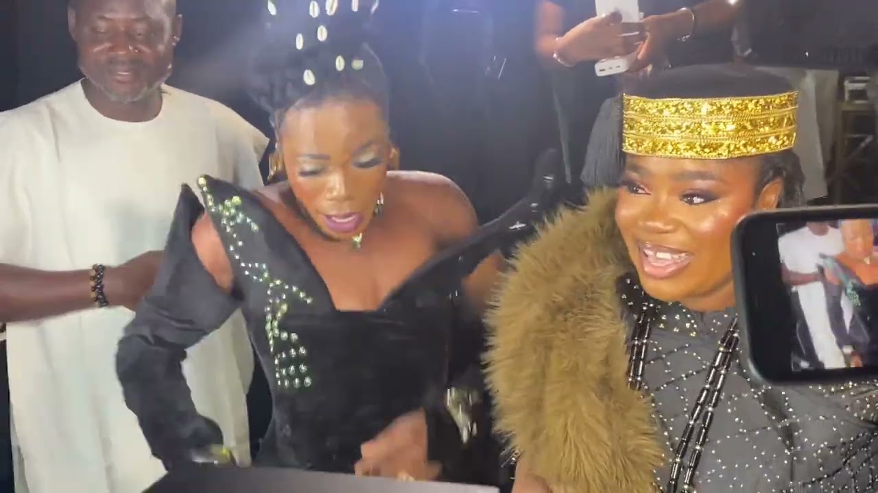 ENIOLA AJAO ON THE DANCE FLOOR WITH IYABO OJO AT LABAKEOLODODO MOVIE PREMIERE