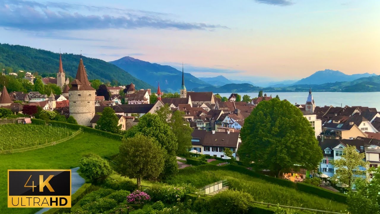 Zug, Switzerland 🇨🇭| The Town With The Most Beautiful Sunsets | Walking Tour | 4K