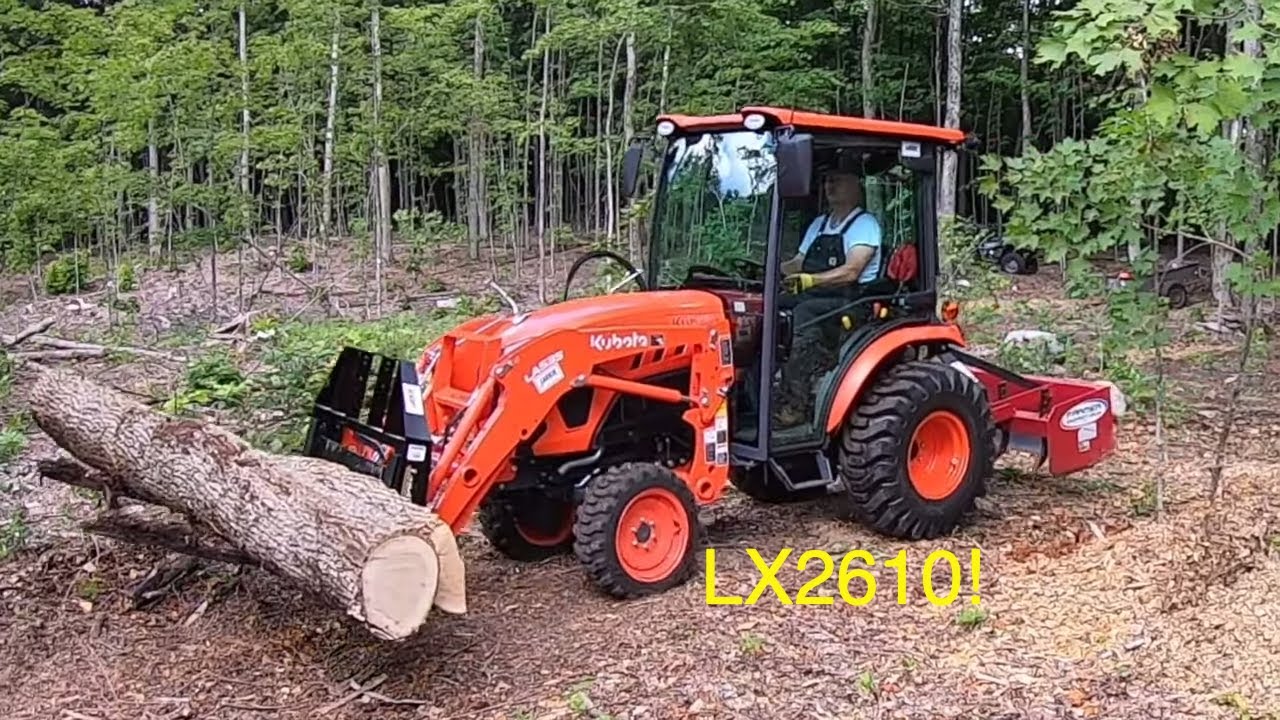 #311 Kubota LX2610 compact tractor. Skidding Ash logs for firewood. Landpride PFL1242 pallet forks.