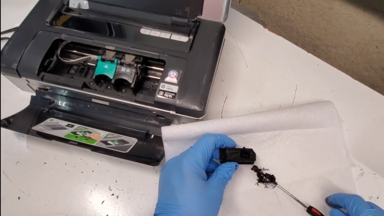 Cleaning Ink Absorber Pad full of gunk on HP  Officejet 100 Mobile Printer