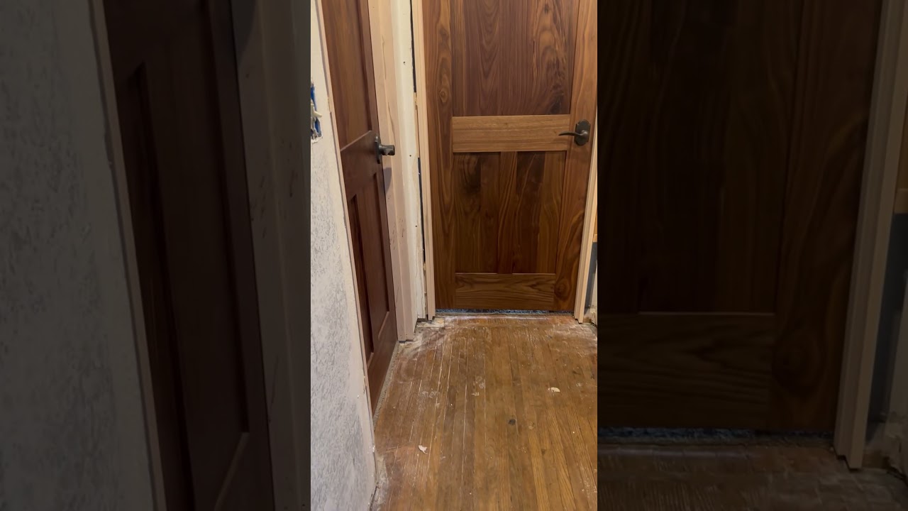 Custom Amish made walnut doors installed in a house built in 1887.