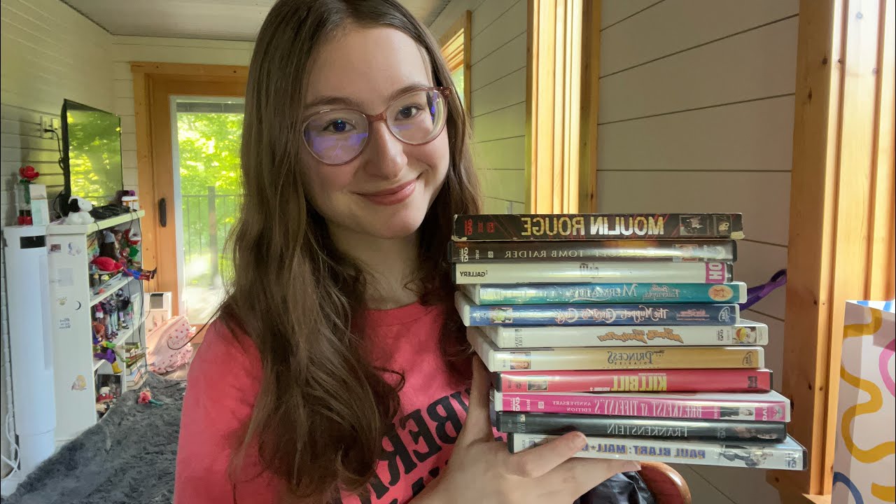 ASMR thrifting haul full of dvds 📀 (tapping+ scratching triggers)