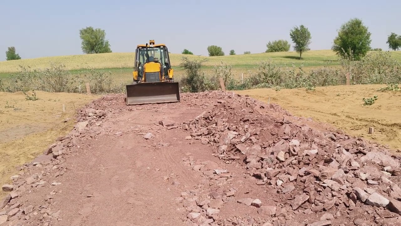 Jcb machine working at rocks 