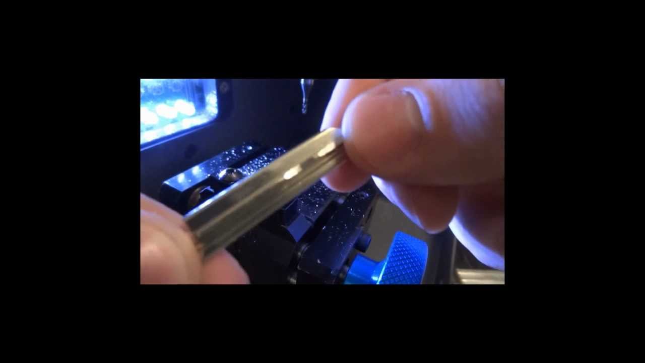 SUPORTE CUT1: Corte de chave SX9 Lado A (TETRA PSA)