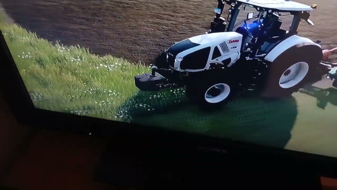 Christophe aube patron  claas 950 axion  au labourage 