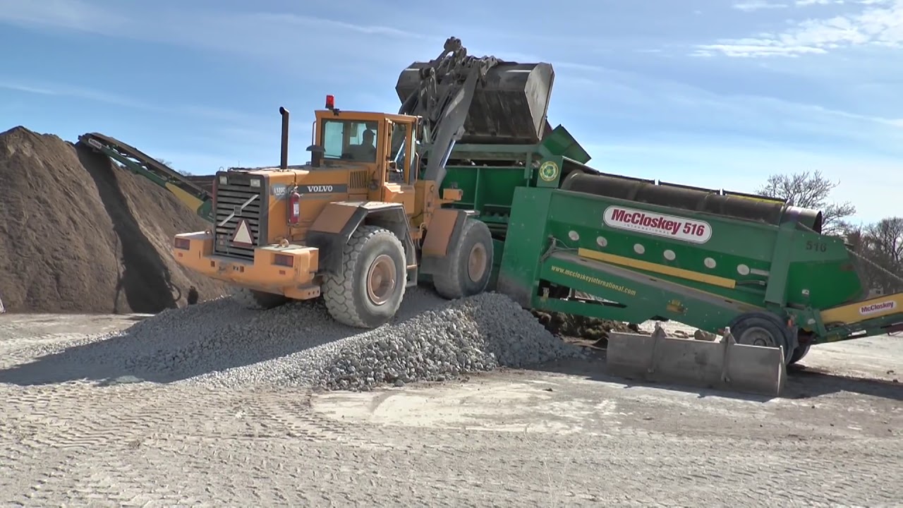 Volvo L120C wheel loader sound sort earth at a racetrack Visby 2013