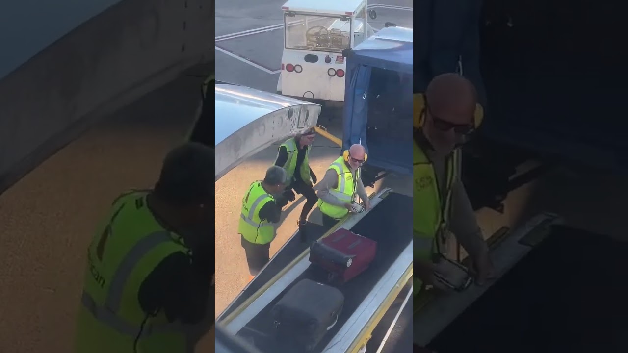 AA Airlines baggage handler works out with luggage