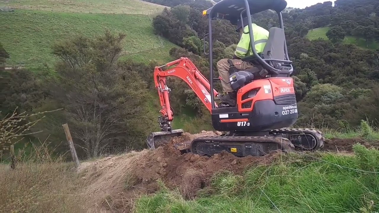 Kubota U17 track cutting down the ridge of certain death