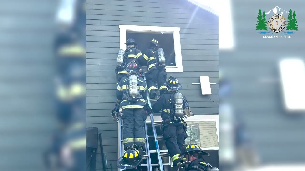 Double Ladder Rescue Residential Fire